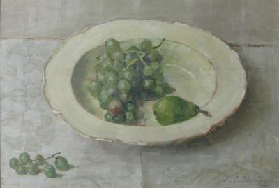 Druiven en peer op bord (1925-1930) door Lucie van Dam van Isselt